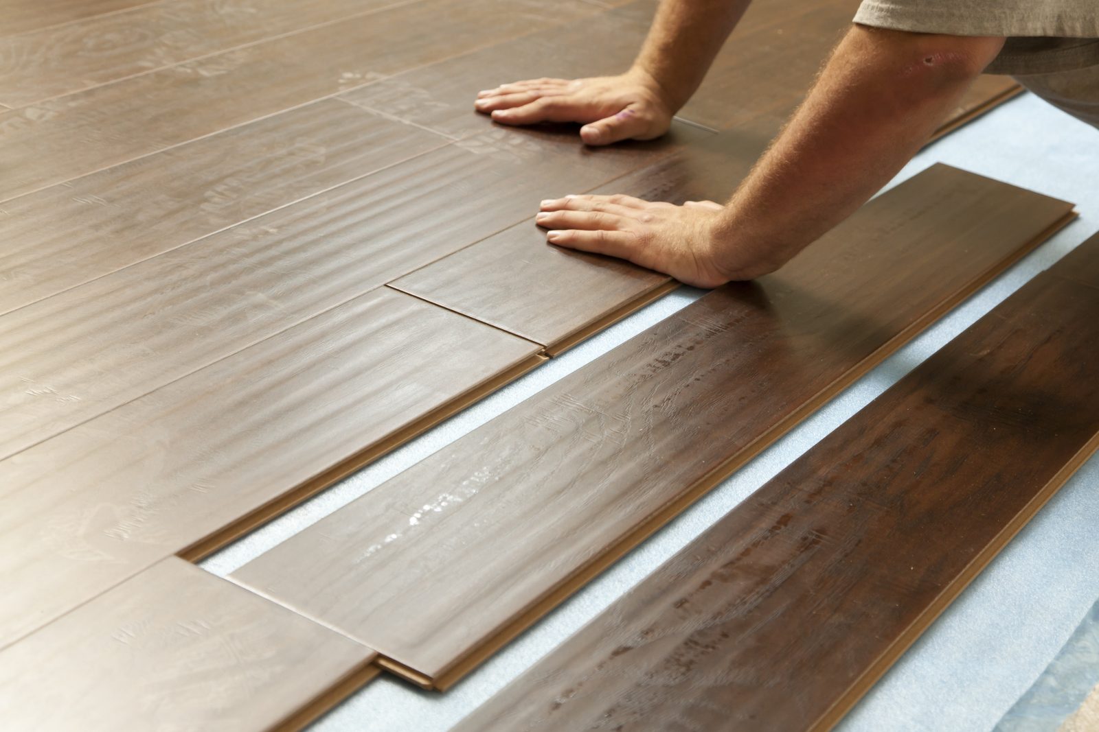Man installing new Laminate flooring | Floorida Floors